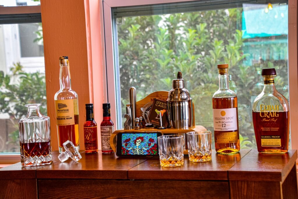 Stocked bar in Fairhope vacation rental on the bay featuring Grateful Dead skull and roses