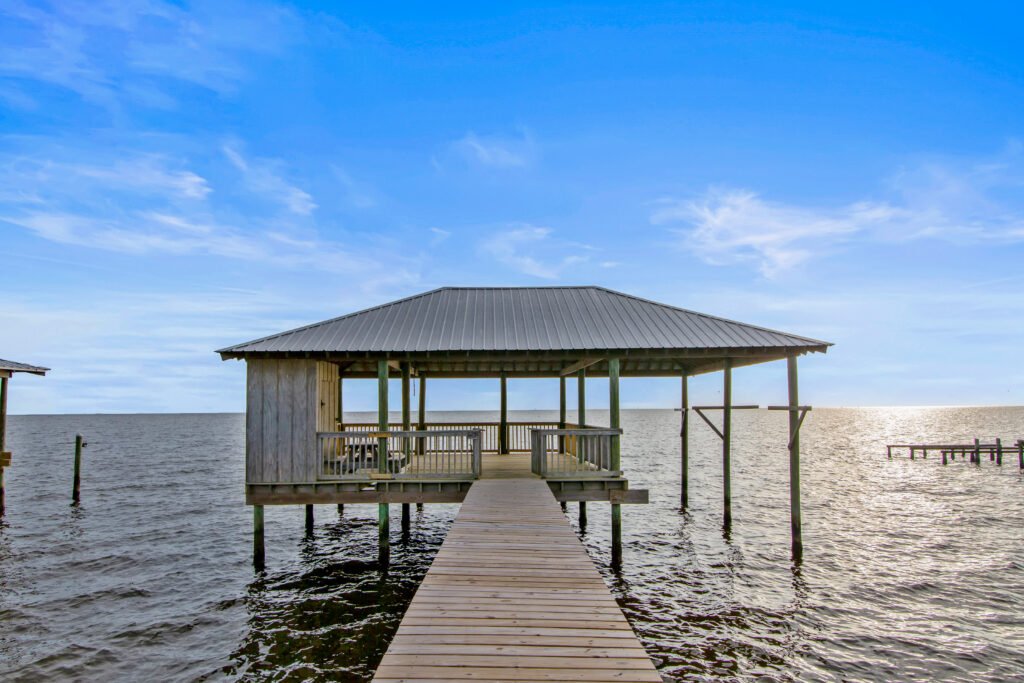 Waterfront cottage Fairhope - sunset private pier blue sky