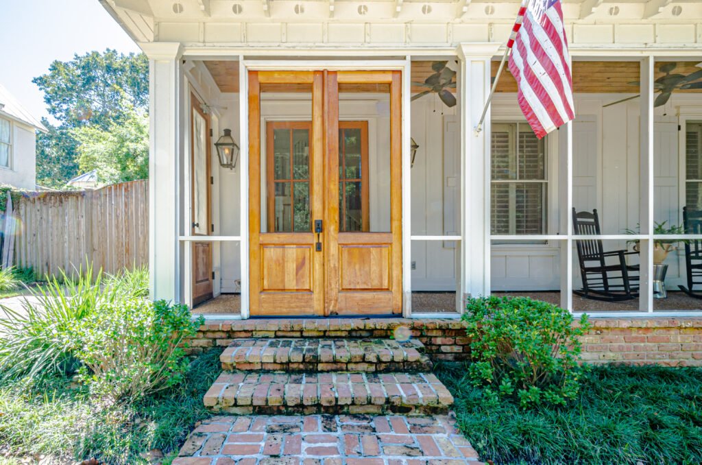 Emerson House - Fairhope vacation rental - exterior front door w/ flag