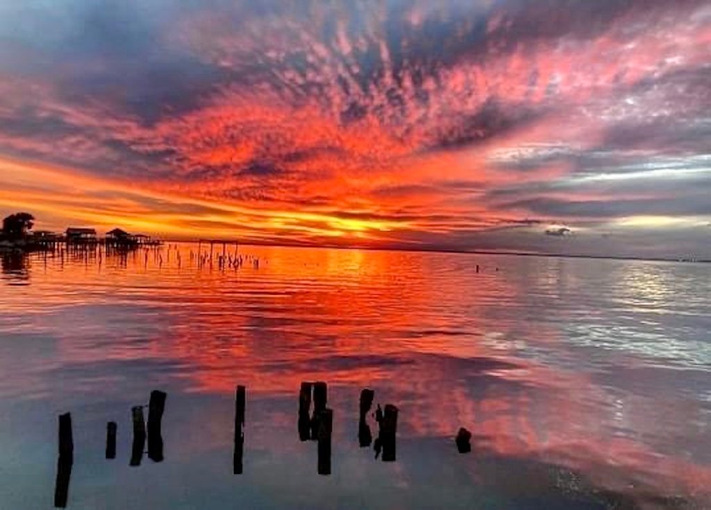 Sunset Mobile Bay sky on fire near Fairhope Alabama vacation rental on the bay