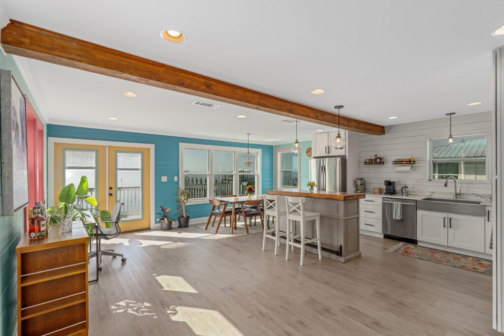 Key West inspired color scheme accentuates bay life on shiplap walls. Colors include Vintage Vessel, Jamaica Bay, and Pink Flamingo.