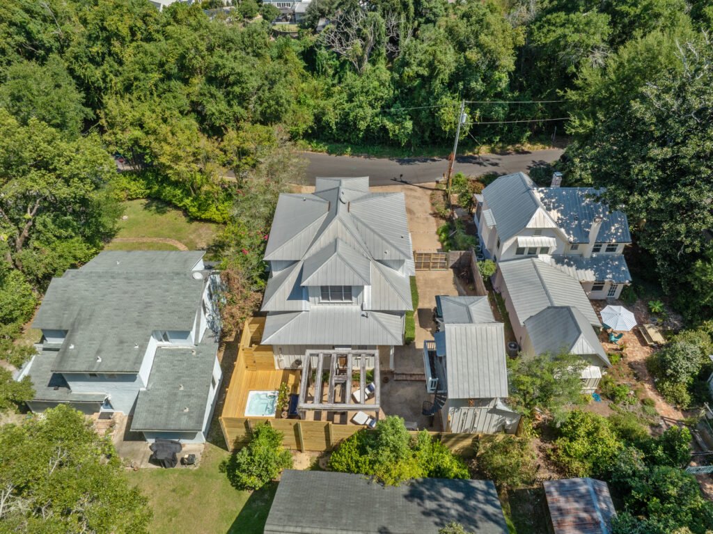 Close aerial view of Emerson House Fairhope including back yard. December 2025.