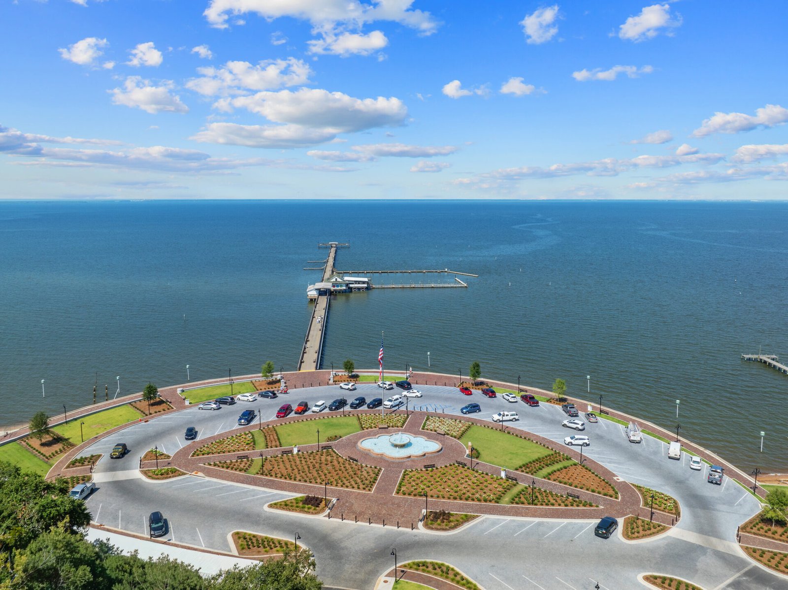 The renovated Fairhope Municipal Pier with new decking and handrails overlooking Mobile Bay