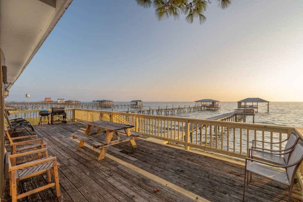 Vacation rental deck view of Mobile Bay sunset in Fairhope